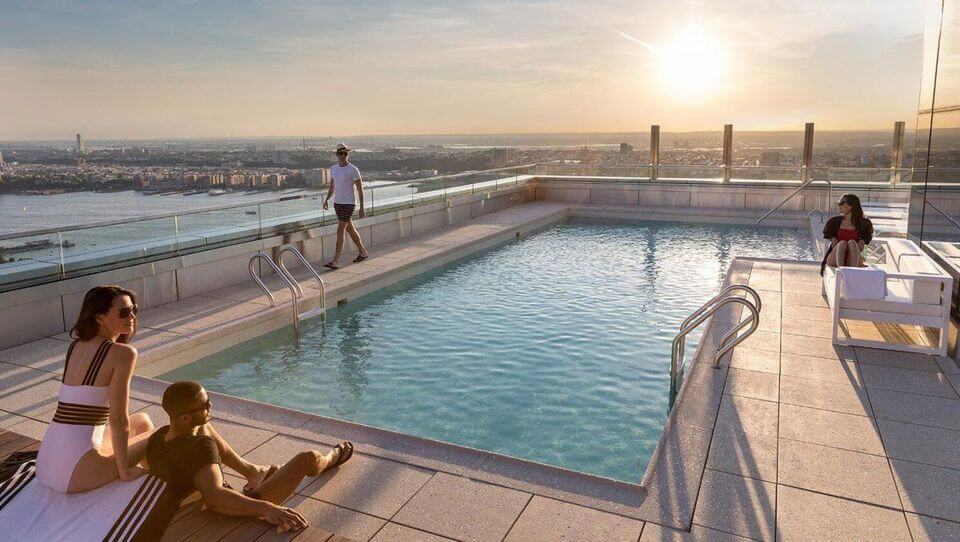 Tenants in 555TEN can take a dip in a 15-by-43-foot saltwater plunge pool.

